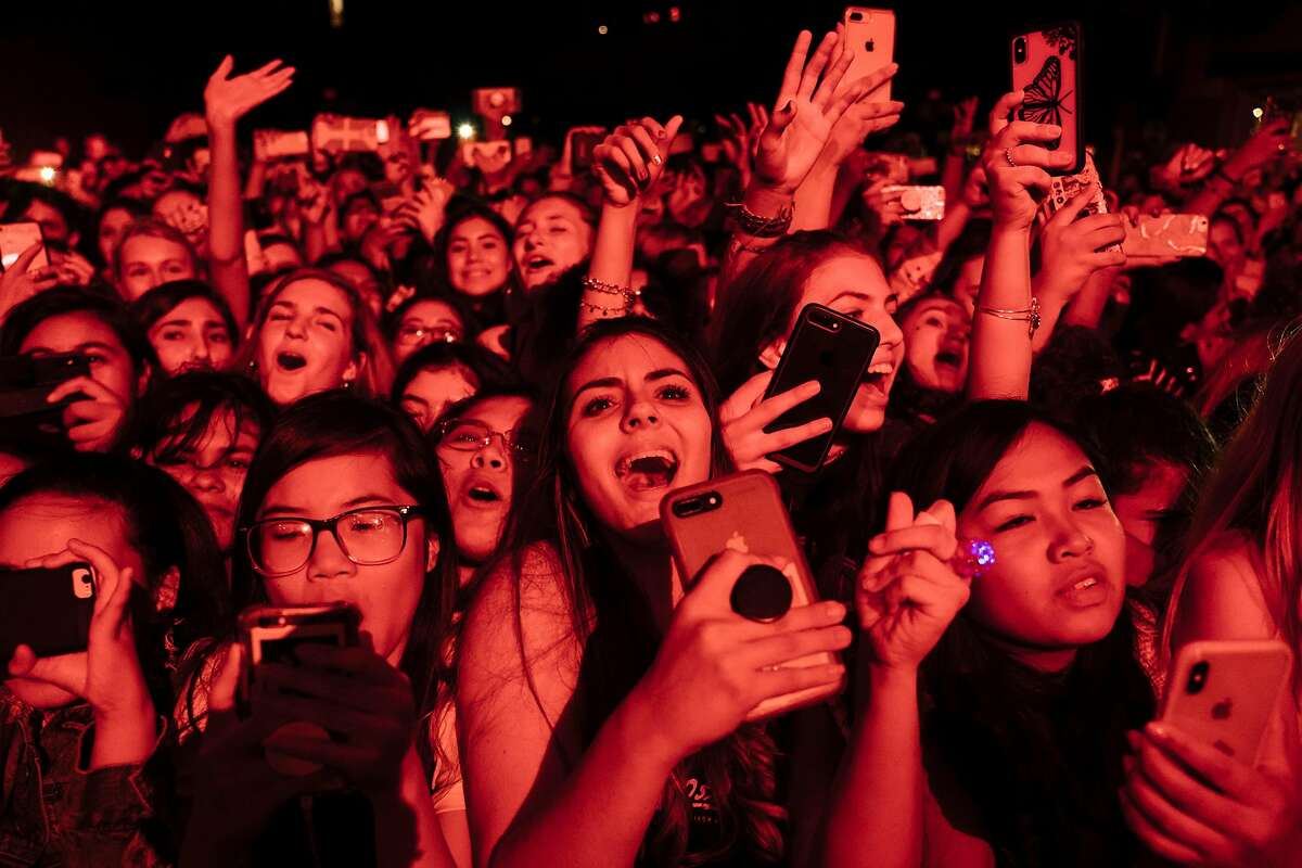 Conferences, seated live events, sports and indoor concerts — such as this Calpurnia performance at the Fillmore in 2018 — can resume, starting April 15, state officials said.