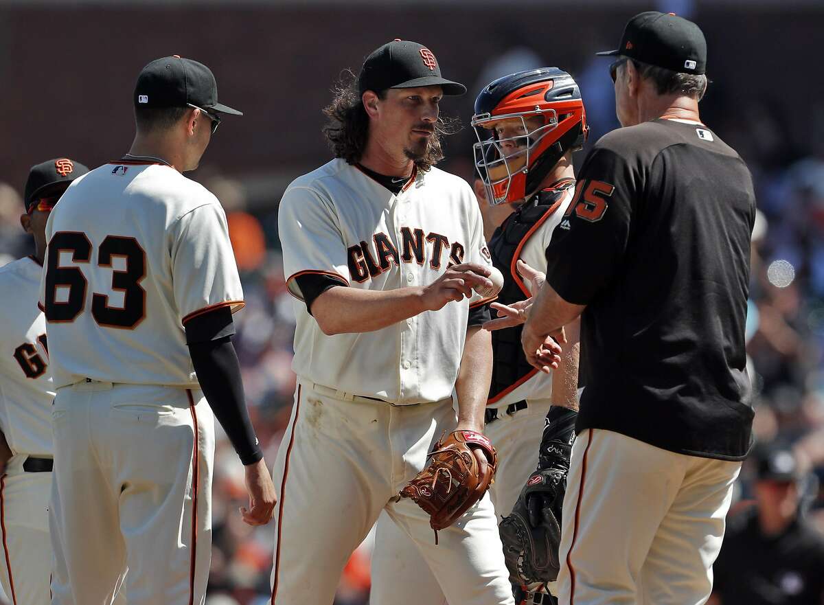 Jeff Samardzija (29) hands the ball to manager Bruce Bochy after pitching into the seventh inning as the San Francisco Giants played the Arizona Diamondbacks at AT&T Park in San Francisco, Calif., on Sunday, August 6, 2017. The Giants won 6-3. as the San Francisco Giants played the Arizona Diamondbacks at AT&T Park in San Francisco, Calif., on Sunday, August 6, 2017. The Giants won 6-3.