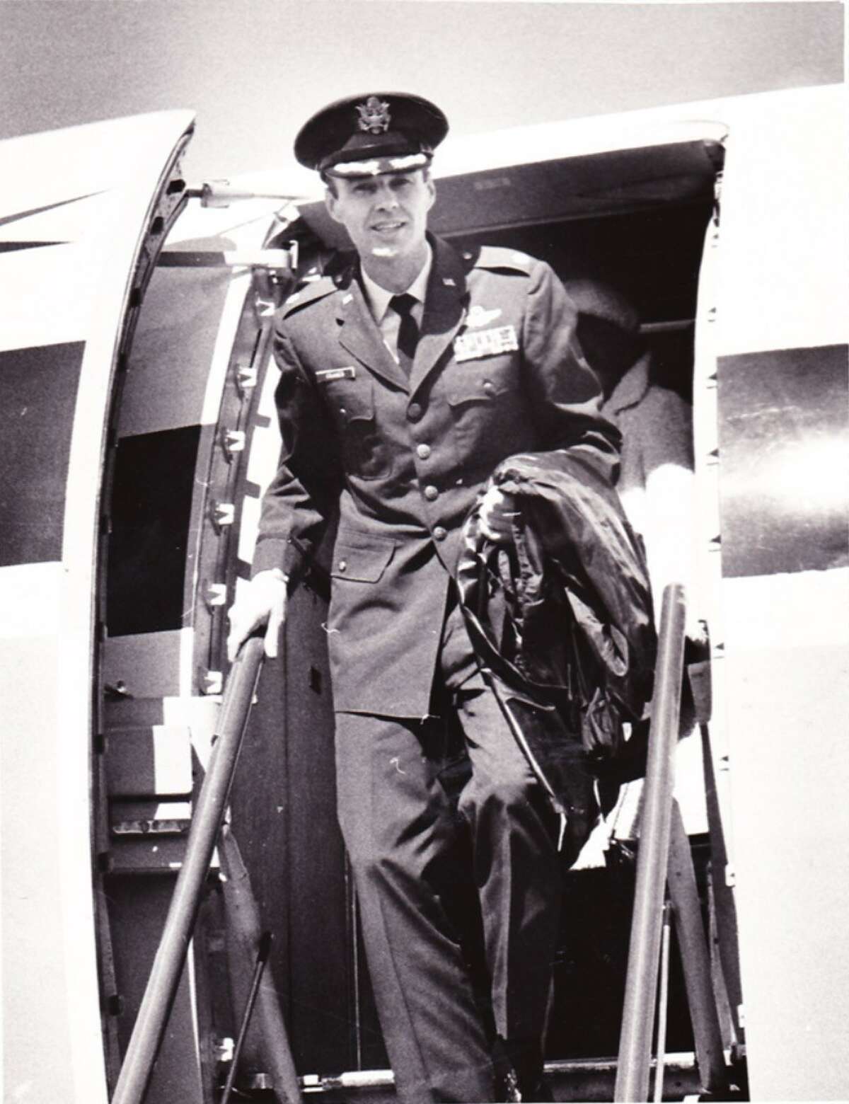 Col. Robert Roger Craner steps off an airliner at Albany County Airport March 23, 1973 on his way to a parade for him in Cohoes.