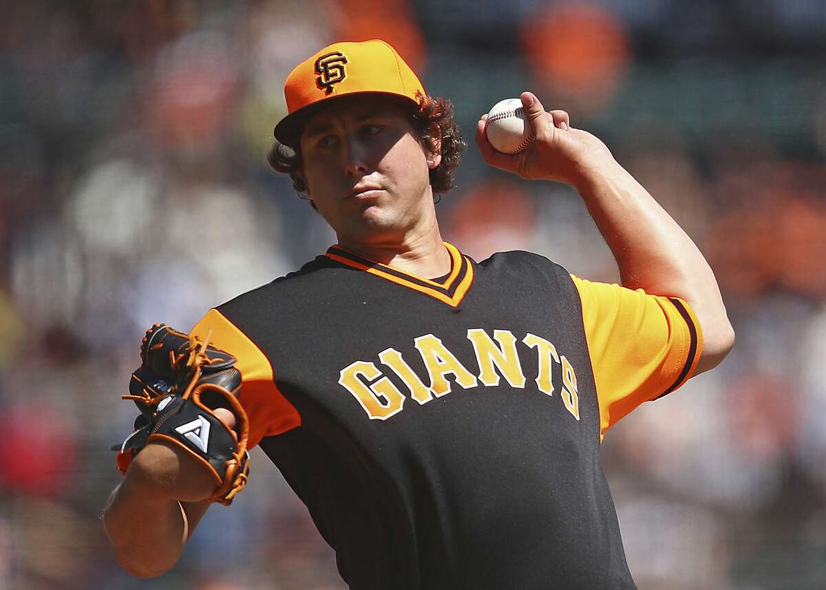San Francisco Giants pitcher Derek Holland works against the Texas Rangers in the first inning of a baseball game Sunday, Aug. 26, 2018, in San Francisco. (AP Photo/Ben Margot)