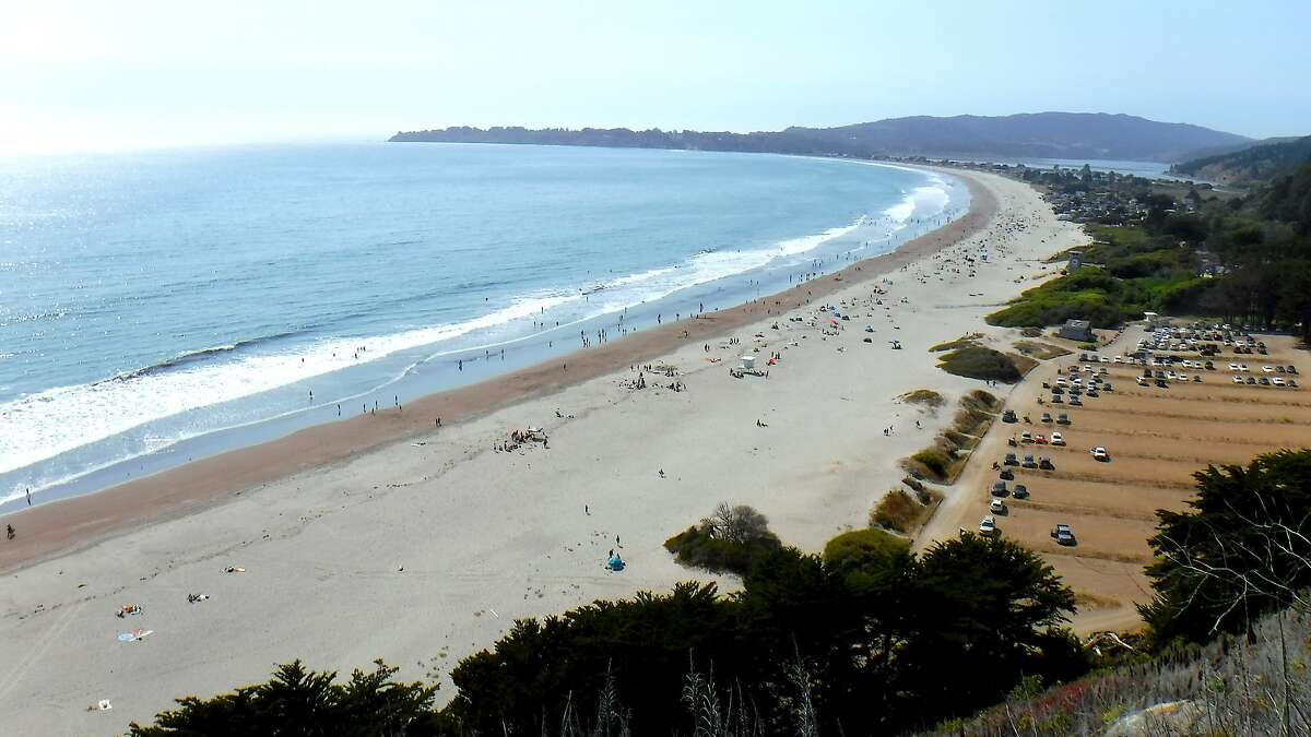 Overlook of Stinson Beach shows miles of beach extending north to mouth of Bolinas Lagoon with plenty of parking.