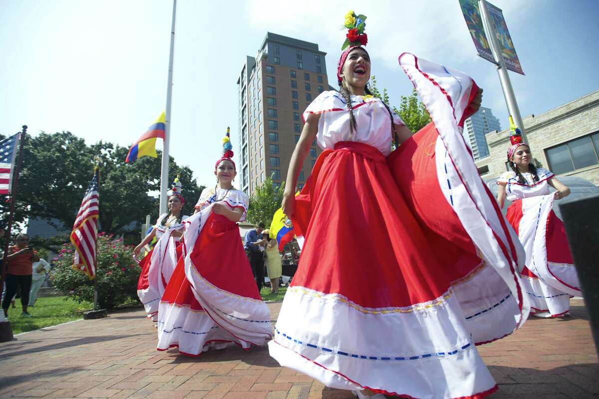 Members of the dance group Danczarte Ecuador perform the traditional Bomba dance during the celebration of Ecuador's Independence Day in Columbus Park in downtown Stamford, Conn. on Sunday, Aug. 26, 2018. Ecuadorians celebrate when the capital city Quito broke away from Spain on August 10, 1809.