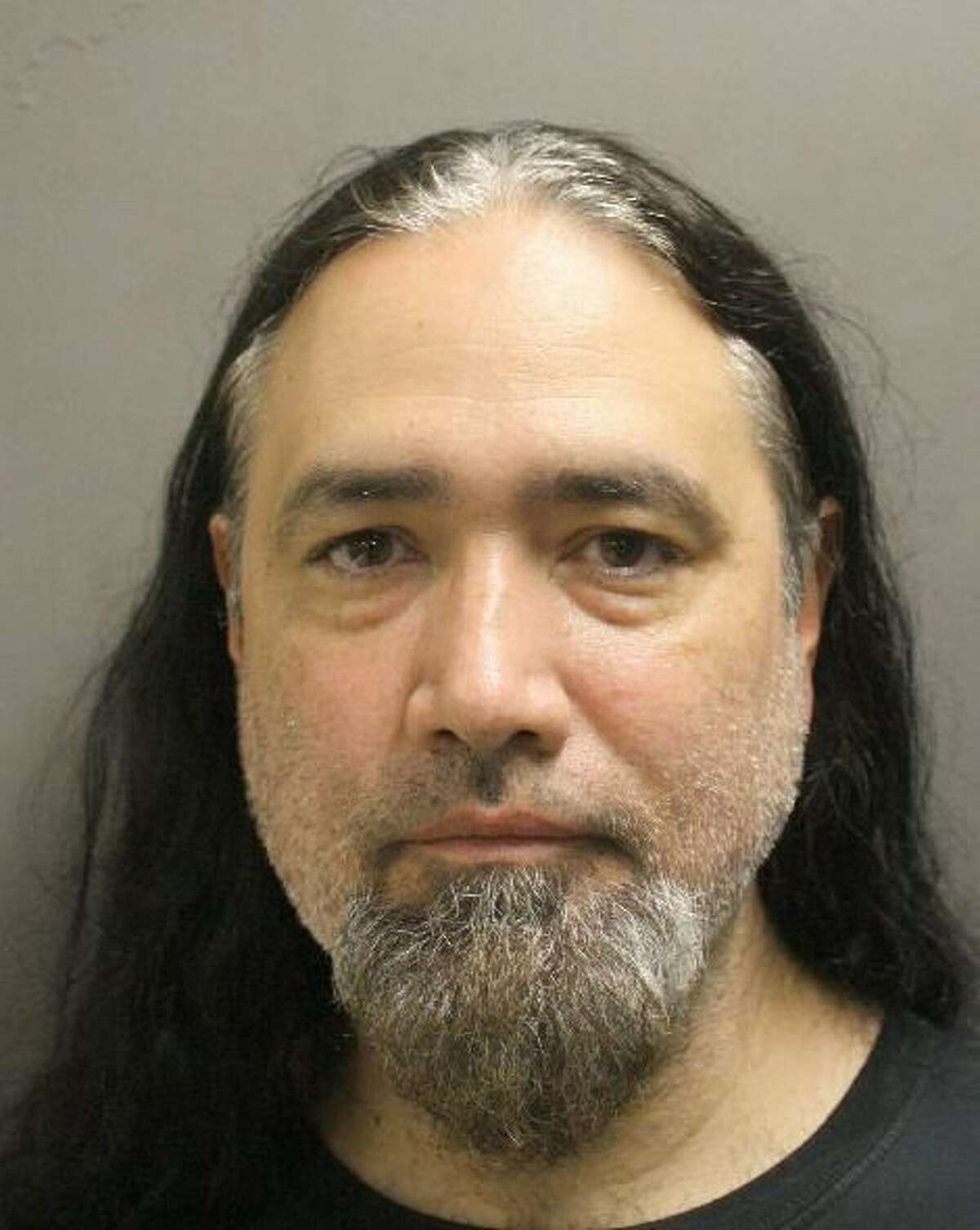 John Guerrero, 48, was arrested Monday after he allegedly left his 11-year-old daughter home alone in Houston while he traveled to Detroit for a concert.