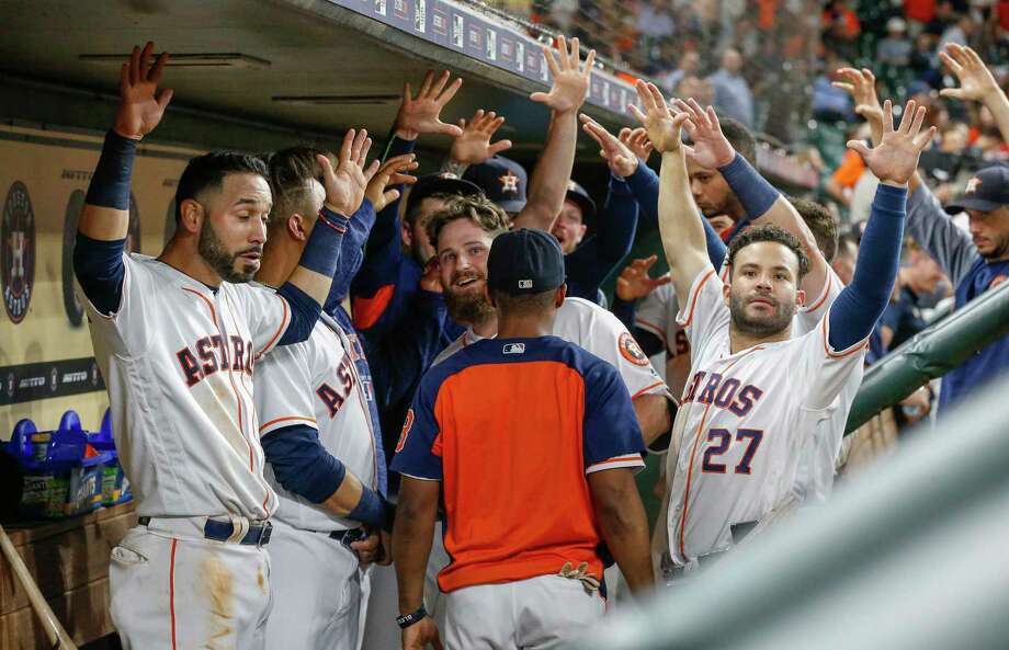 The Houston Astros celebrating in the shelter to Houston Astros second baseman Tyler White (13) hit a homer in the 8th inning during a MLB game at Minute Maid Park Monday, August 27, 2018, in Houston. Photo: Steve Gonzales, Staff Photographer / © 2018 Houston Chronicle