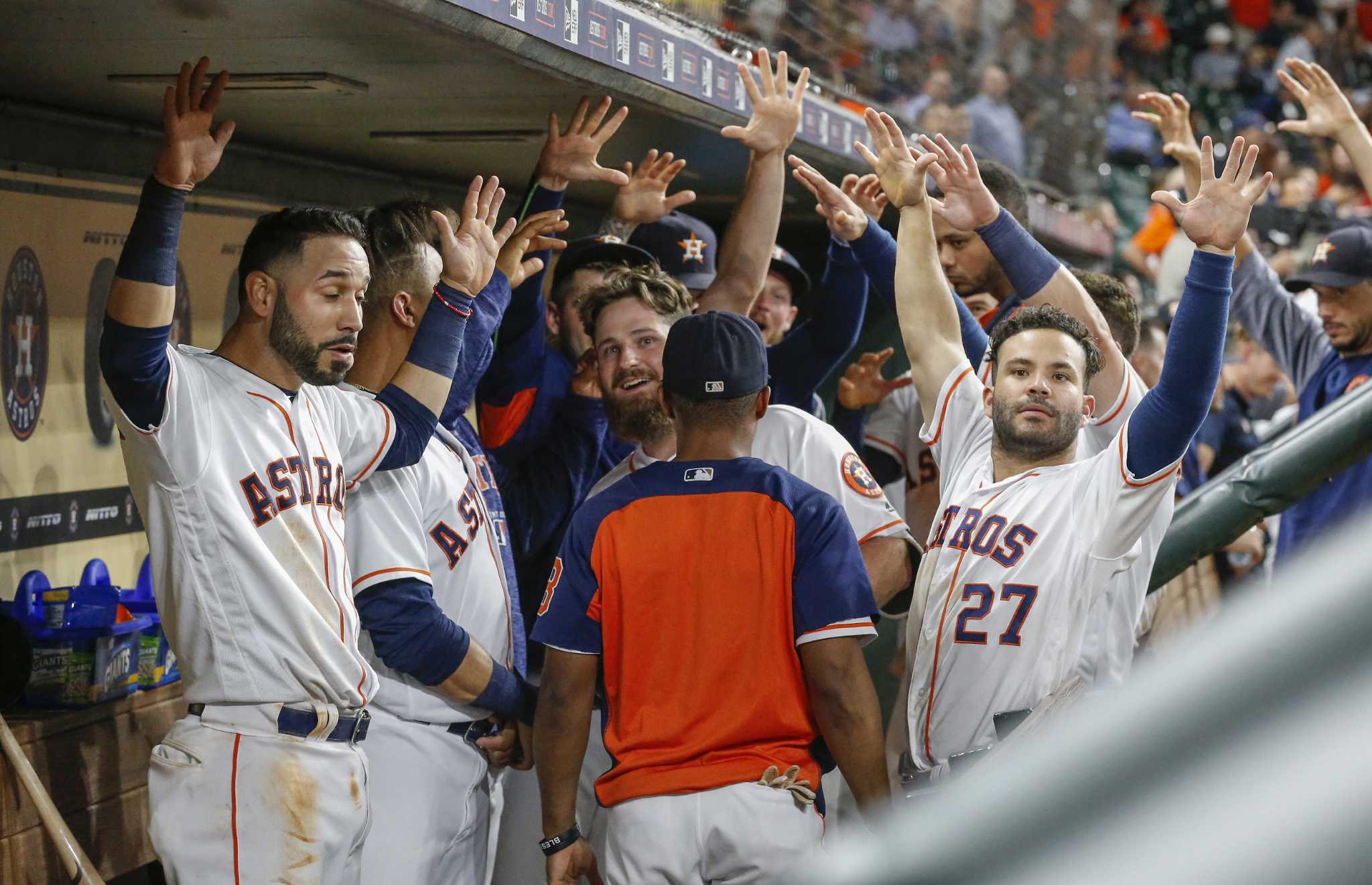 Fans call out to Houston Astros players from above the dugout after the  Astros defeated the Los Angeles Angels 10-4 in their second baseball game,  in Monterrey, Mexico, Sunday, May 5, 2019. (