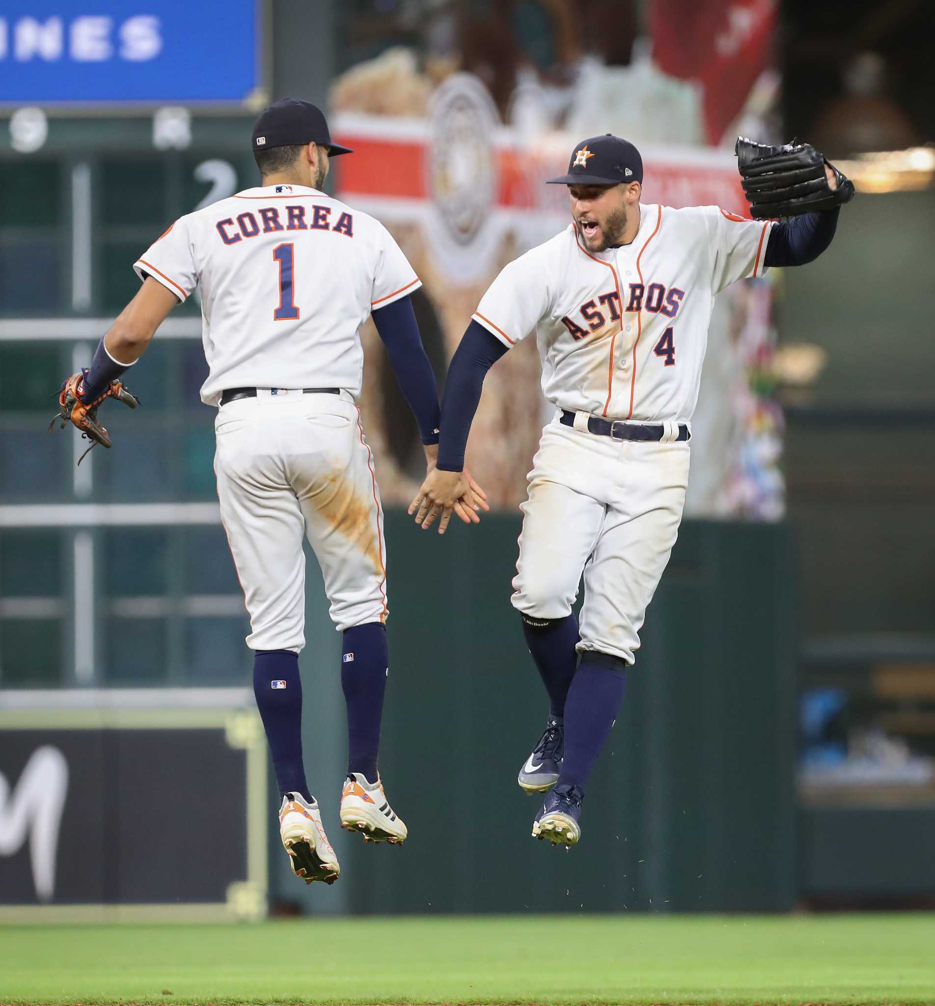 Fans call out to Houston Astros players from above the dugout after the  Astros defeated the Los Angeles Angels 10-4 in their second baseball game,  in Monterrey, Mexico, Sunday, May 5, 2019. (