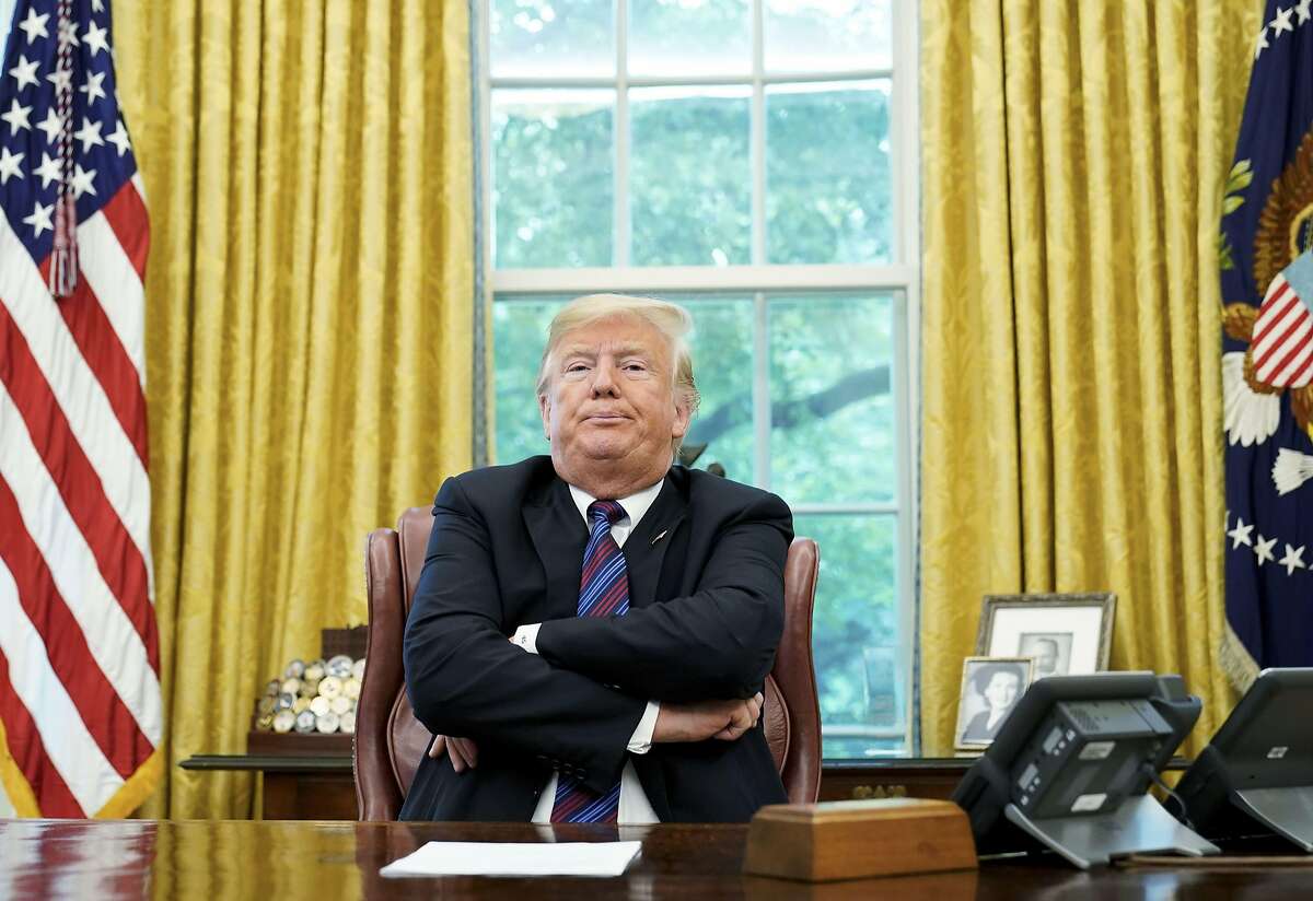 (FILES) In this file photo taken on August 27, 2018 US President Donald Trump speaks to reporters after a phone conversation with Mexico's President Enrique Pena Nieto on trade in the Oval Office of the White House in Washington, DC. - US President Donald Trump claimed August 28, 2018 that Google results were "rigged" because searches for "Trump News" brought up negative stories about him, and questioned whether this was illegal. The president has attacked US social media giants in the past days for allegedly censoring conservative voices, an unfounded claim widely believed by his followers."Google search results for 'Trump News' shows only the viewing/reporting of Fake New Media," the president tweeted on Tuesday. (Photo by MANDEL NGAN / AFP)MANDEL NGAN/AFP/Getty Images