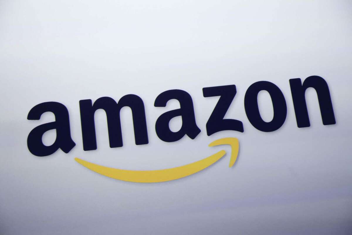 The Connecticut Better Business Bureau is warning state residents of a scam that asks victims to pay hundreds of dollars to get a job with online retailer Amazon. (AP Photo/Mark Lennihan, File)