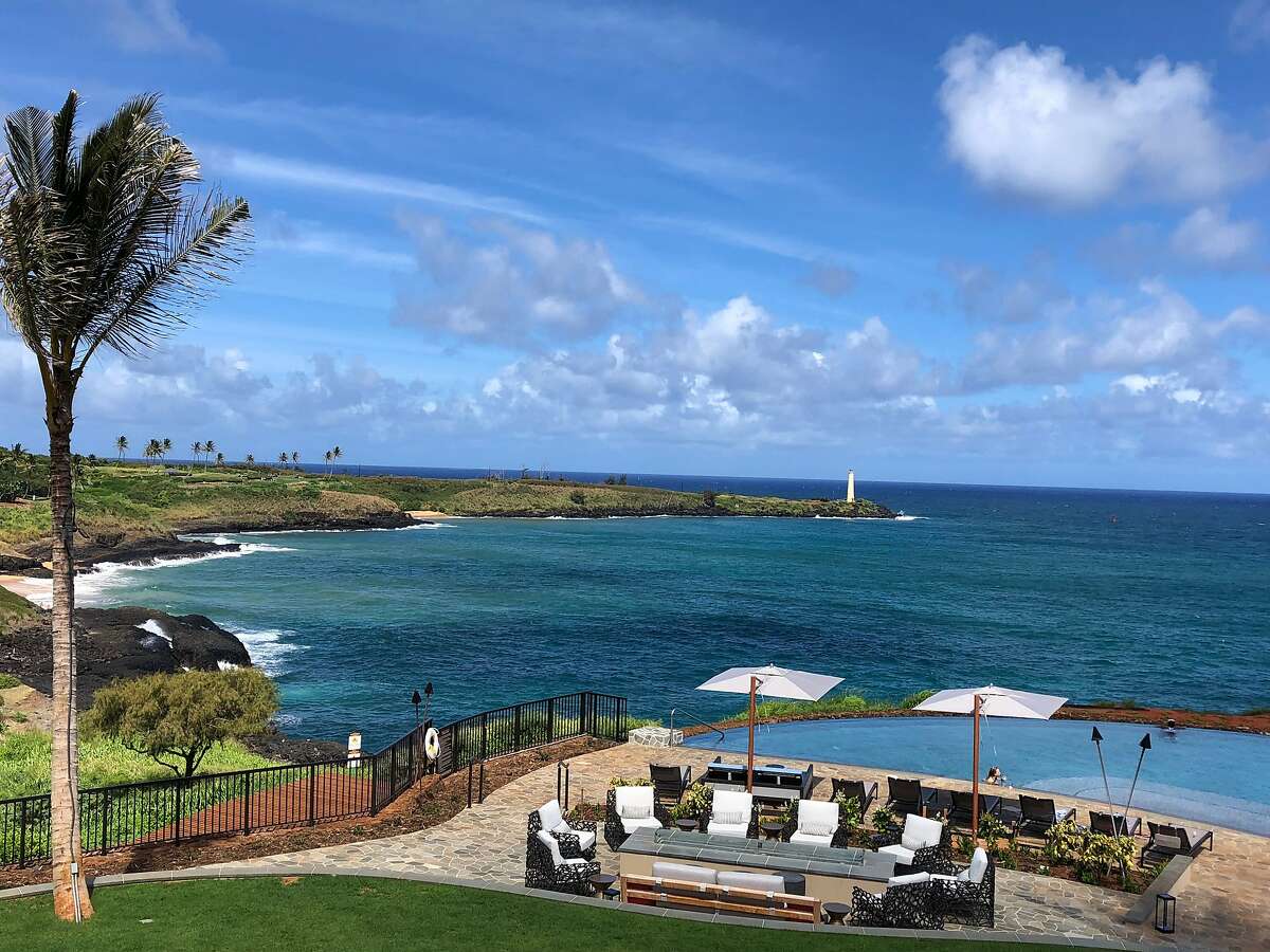 The new Timbers Kauai Ocean Resort and Residences at Hokuala offers views of the lighthouse at Ninini Point.