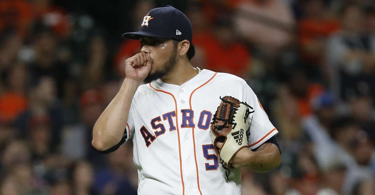 Houston Astros relief pitcher Roberto Osuna (54) reacts after Oakland Athletics Nick Martini's RBI double, the go-ahead run during the ninth inning of an MLB baseball game at Minute Maid Park, Tuesday, August 28, 2018, in Houston.