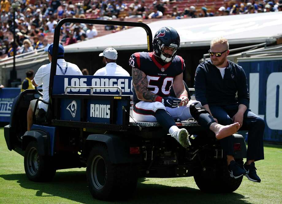 Houston Texans linebacker Ben Heeney is taken off the field after being hunt during the first half in an NFL preseason football game against the Los Angeles RamsSaturday, Aug. 25, 2018, in Los Angeles. (AP Photo/Kelvin Kuo) Photo: Kelvin Kuo, Associated Press / Copyright 2018 The Associated Press. All rights reserved