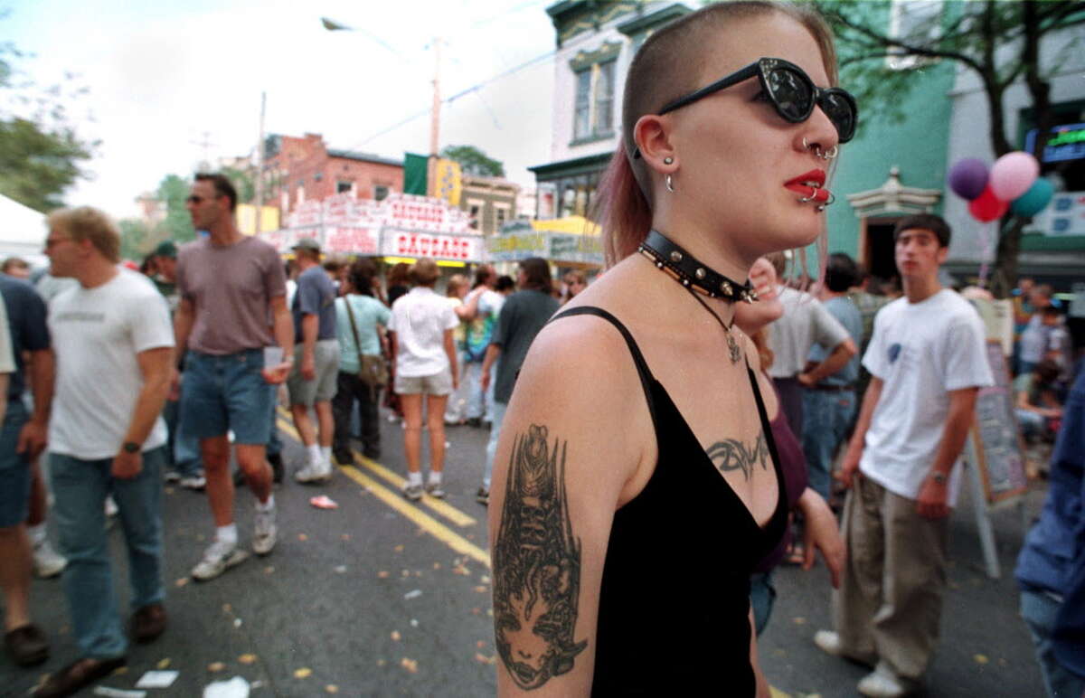 Click through the slideshow to see who our photographers caught on camera in the fall of 1998. SAT. SEPT. 26, 1998 - Kim Wheeler of Albany strolls through the crowded streets during Larkfest, the annual Lark Street block party.