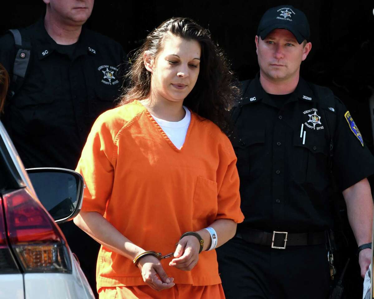 Heaven Puleski, the Schenectady woman charged in connection with the death of her 4-month-old son, is led out of City Court following a preliminary hearing on Wednesday, Aug. 29, 2018, in Schenectady, N.Y. (Will Waldron/Times Union)