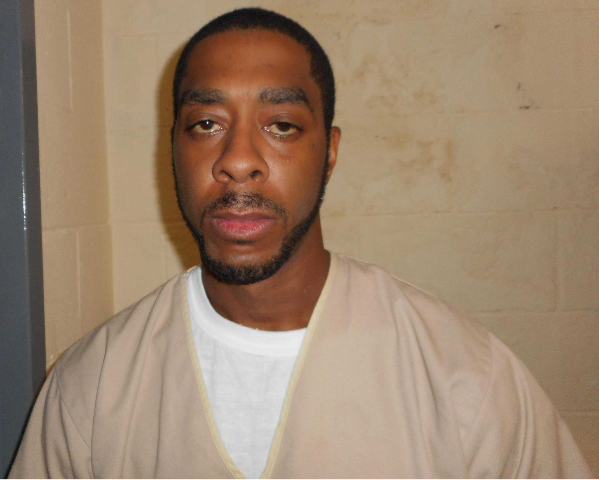 Man charged with violating restraining order