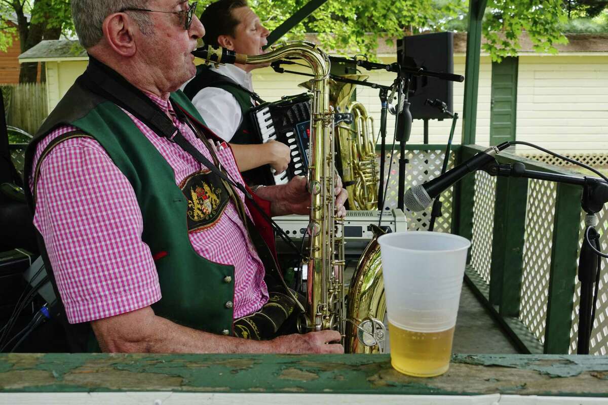 Vic Meister, foreground, and Gregory Reinwald, background, members of the Greg and the Brauhaus Band, perform during a picnic at the German-American Club of Albany on Sunday, August 19, 2018, in Albany, N.Y. (Paul Buckowski/Times Union)