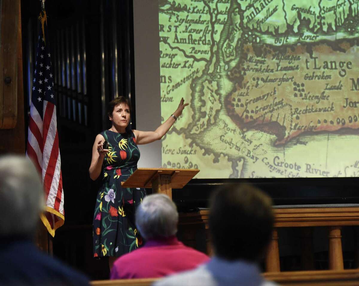 Author Missy Wolfe points to a map of Greenwich, New York and the Long Island Sound while speaking about her book “Hidden History of Colonial Greenwich” during the Retired Men’s Association’s weekly speaker series at First Presbyterian Church Wednesday.