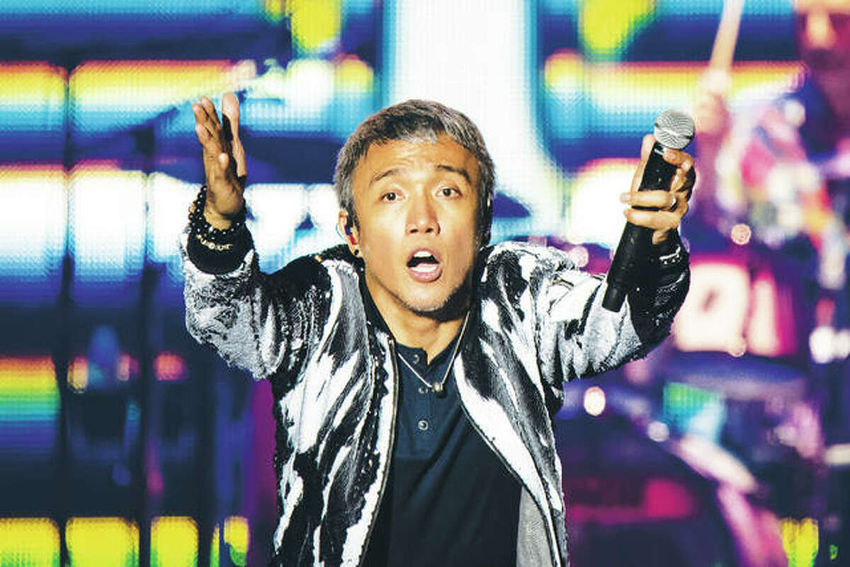 Arnel Pineda of Journey performs during a concert Saturday Aug. 6