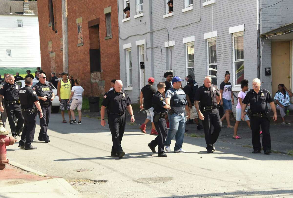 Police leave the scene after a standoff near Trenton and Fourth Streets on Wednesday, Aug. 29, 2018 in Troy, N.Y. (Lori Van Buren/Times Union)