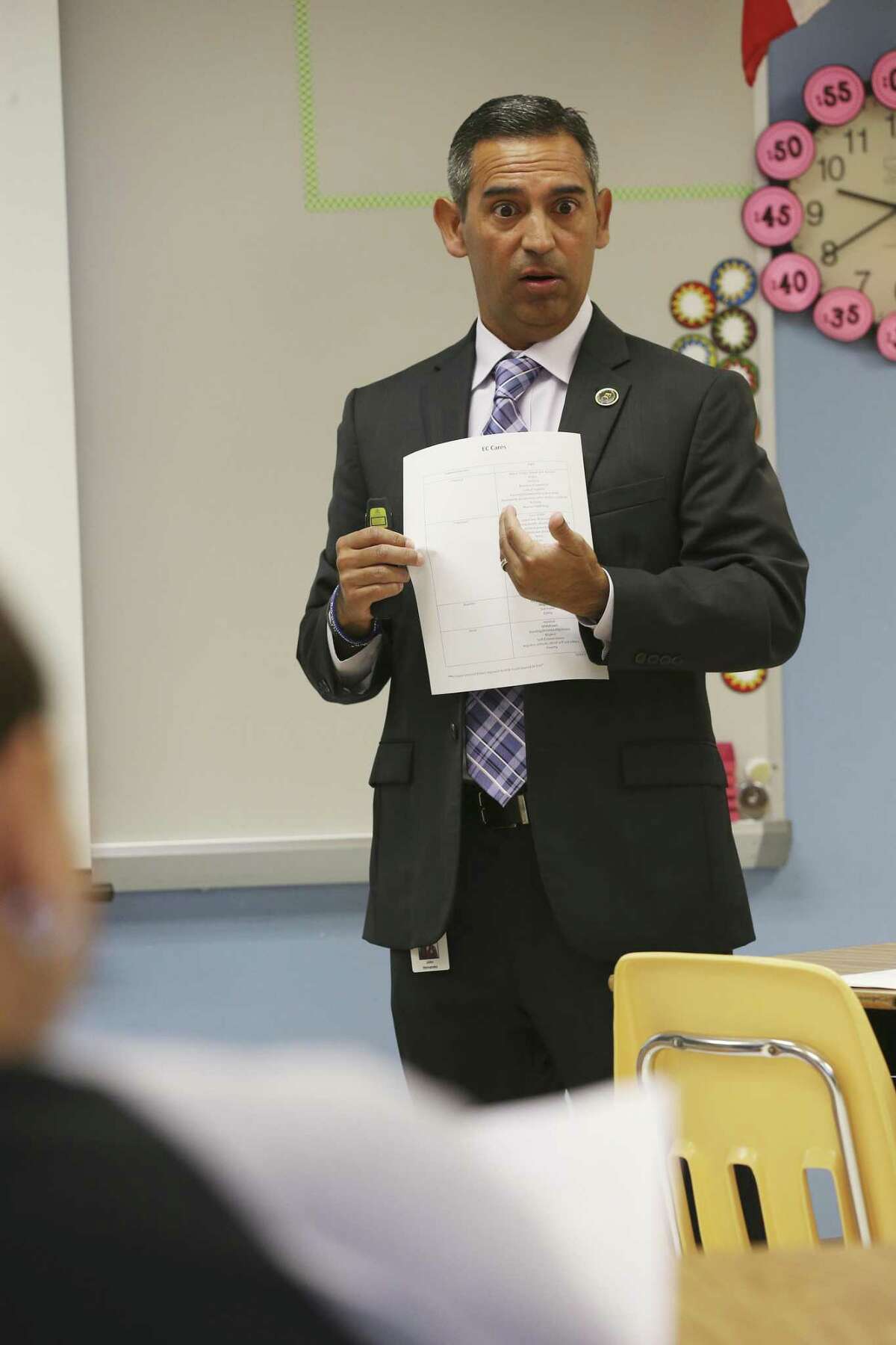 East Central Independent School District Director of Student Service John Hernandez conducts an EC Cares presentation for staff at Oak Crest Elementary School, Thursday, August 23, 2018. Hernandez developed the "trauma-sensitive school" system for his district, training bus drivers, cafeteria workers and custodians -- not just teachers and counselors -- how to recognize early signs of trouble, big and small, in students so counselors can respond immediately.