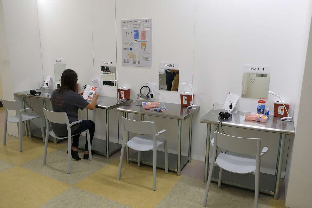 In this photo taken Wednesday, Aug. 29, 2018, are booth injection stations at Safer Inside, a realistic model of a safe injection site in San Francisco. The model is an example of a supervised, indoor location where intravenous drug users can consume drugs in safer conditions and access treatment and recovery services. (AP Photo/Eric Risberg)