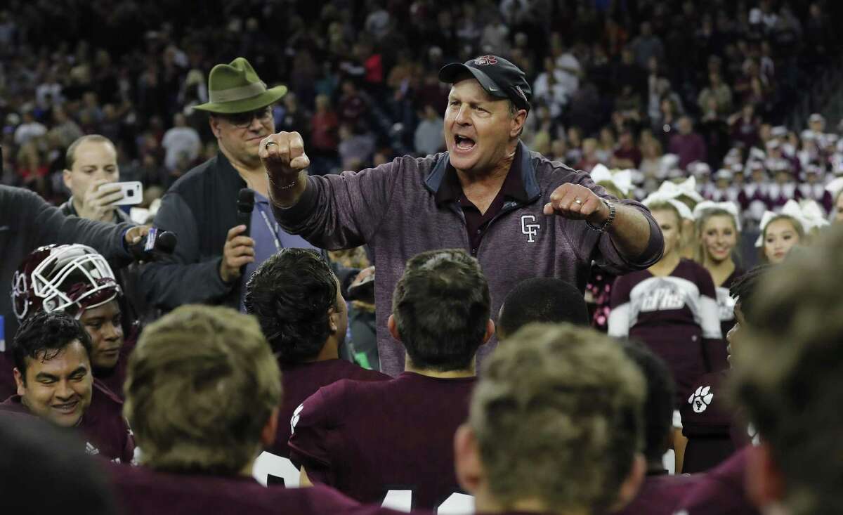 Cy Fair head coach Ed Pustejovsky addresses the team after the high school football semifinal playoff playoff game between Austin Westlake and Cy Fair at NRG Stadium in Houston, on Saturday, December 16, 2017.