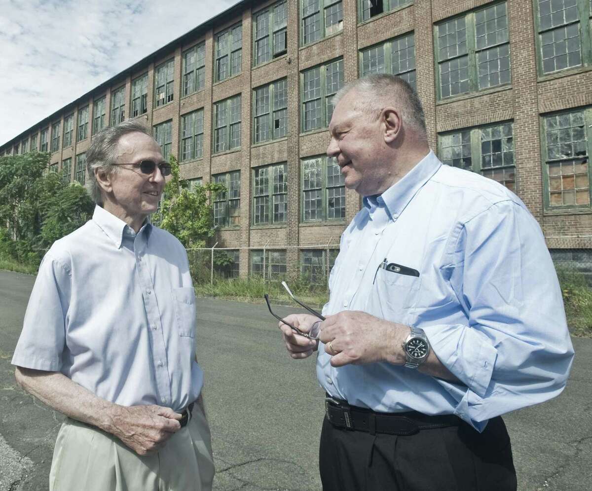 Former Redding selectmen, Donald Takacs and Leon Karvelis, are encouraging the current selectmen to take over the old Gilbert and Bennett wire mill property, so it can be used to generate solar power and offer recreation. Friday, Aug. 31, 2018