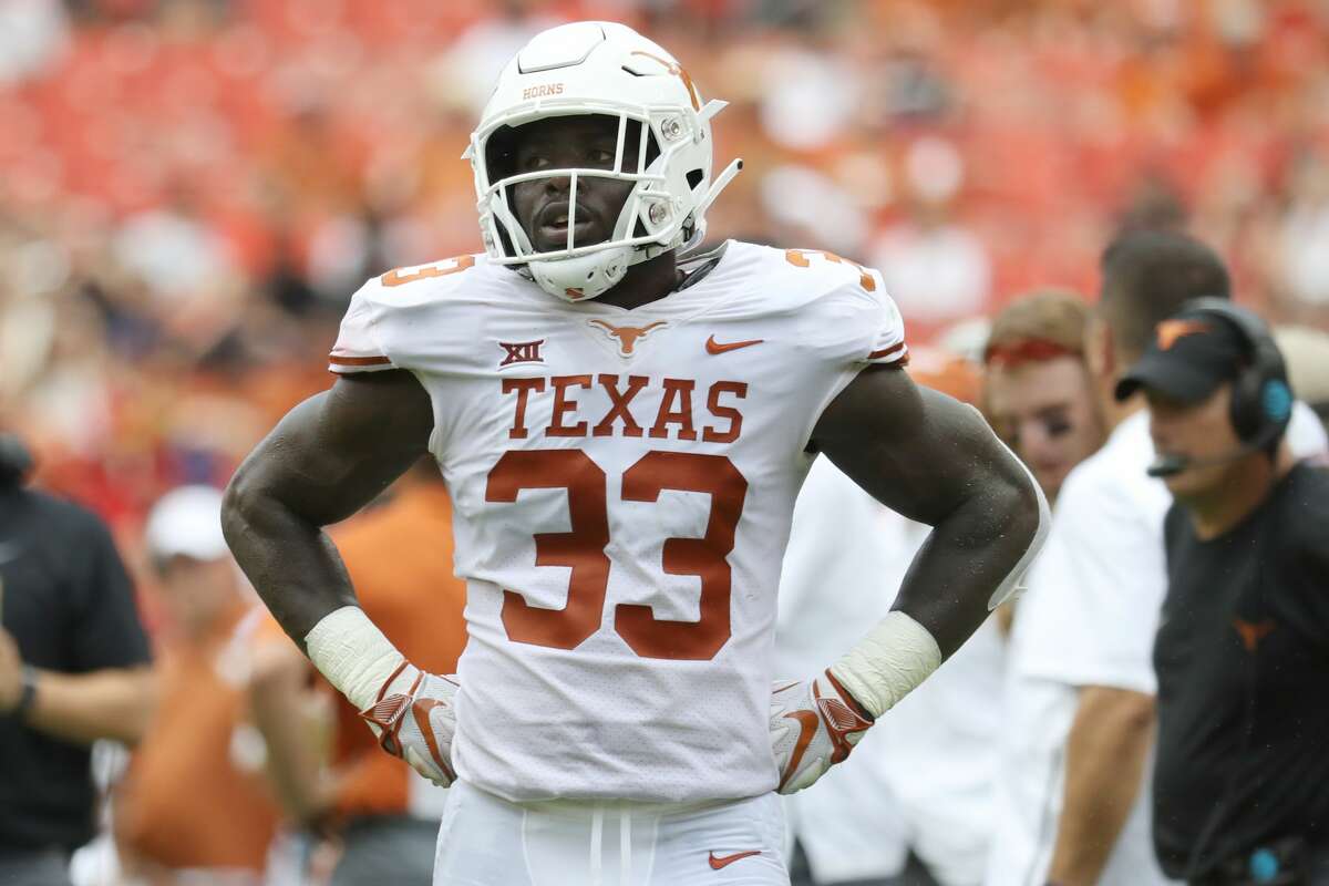 LANDOVER, MD - SEPTEMBER 1: Gary Johnson #33 of the Texas Longhorns looks during a play review against the Maryland Terrapins in the first half at FedExField on September 1, 2018 in Landover, Maryland. Johnson was ejected from the game for a targeting penalty. (Photo by Rob Carr/Getty Images)