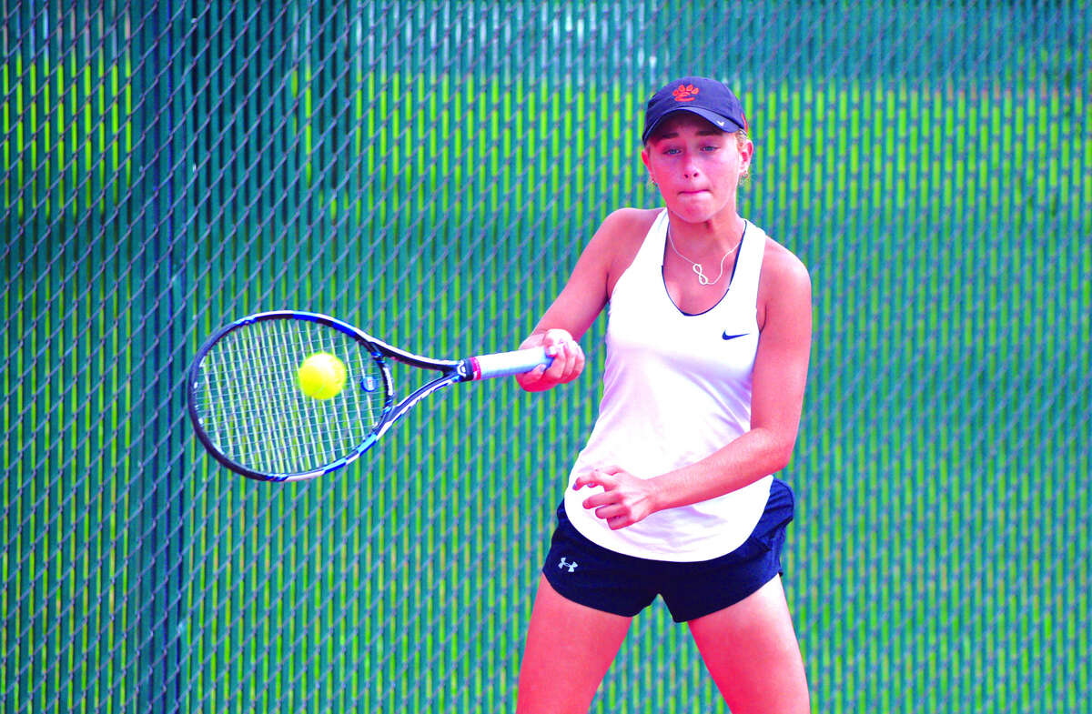 Edwardsville sophomore Grace Hackett returns a shot during her No. 6 singles match on Saturday against New Trier 1 in the semifinals of the Heather Bradshaw Invitational.