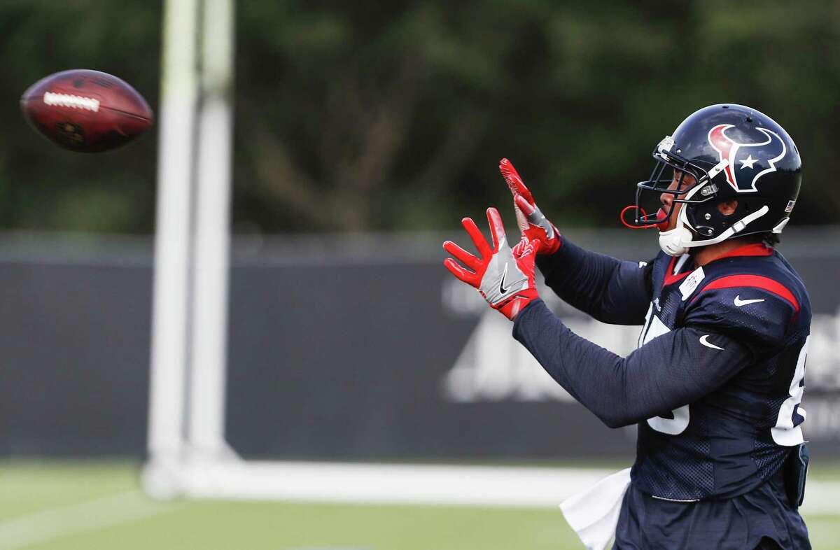 Houston Texans tight end MyCole Pruitt (85) reaches to make a catch during training camp at the Methodist Training Center on Tuesday, Aug. 14, 2018, in Houston.