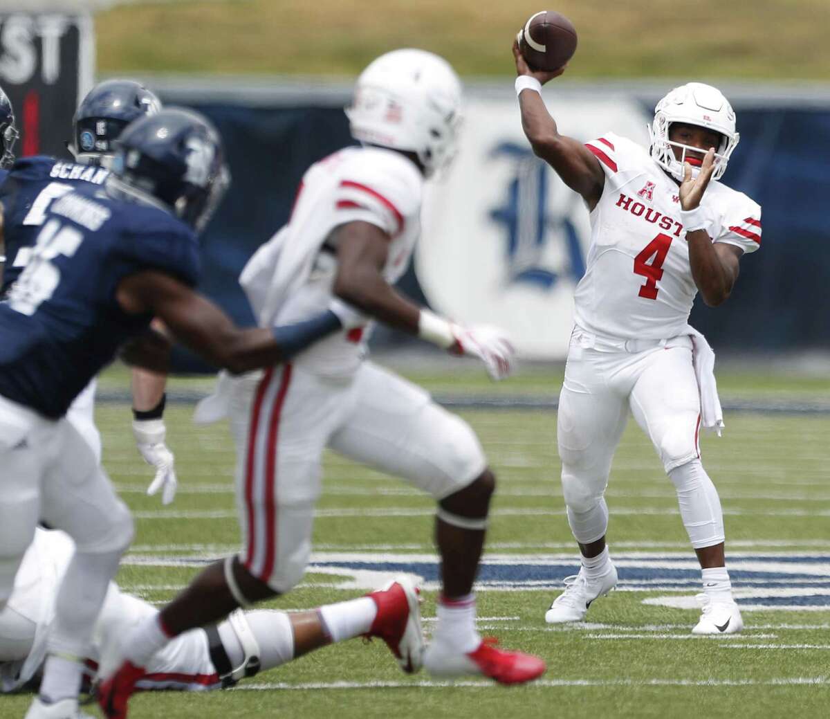 Houston quarterback D'Eriq King (4) throws a pass against Rice during the fourth quarter of an NCAA football game at Rice Stadium on Saturday, Sept. 1, 2018, in Houston.
