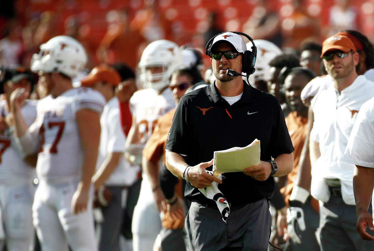 Texas head coach Tom Herman walks on the sideline in the second half of an NCAA college football game against Maryland, Saturday, Sept. 1, 2018, in Landover, Md. (AP Photo/Patrick Semansky)
