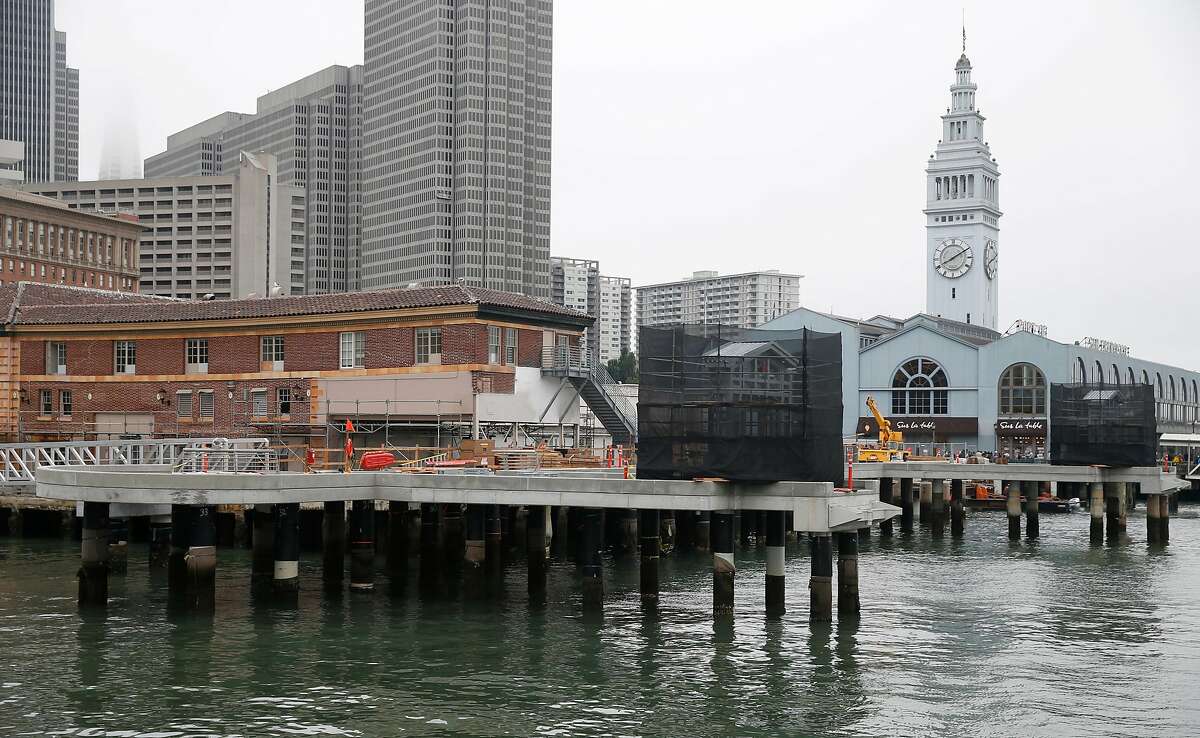 New ferry docks are under construction at the Ferry Building in San Francisco, Calif. on Friday, Aug. 31, 2018. The docks are raised significantly higher than the existing ones to compensate for rising sea levels.