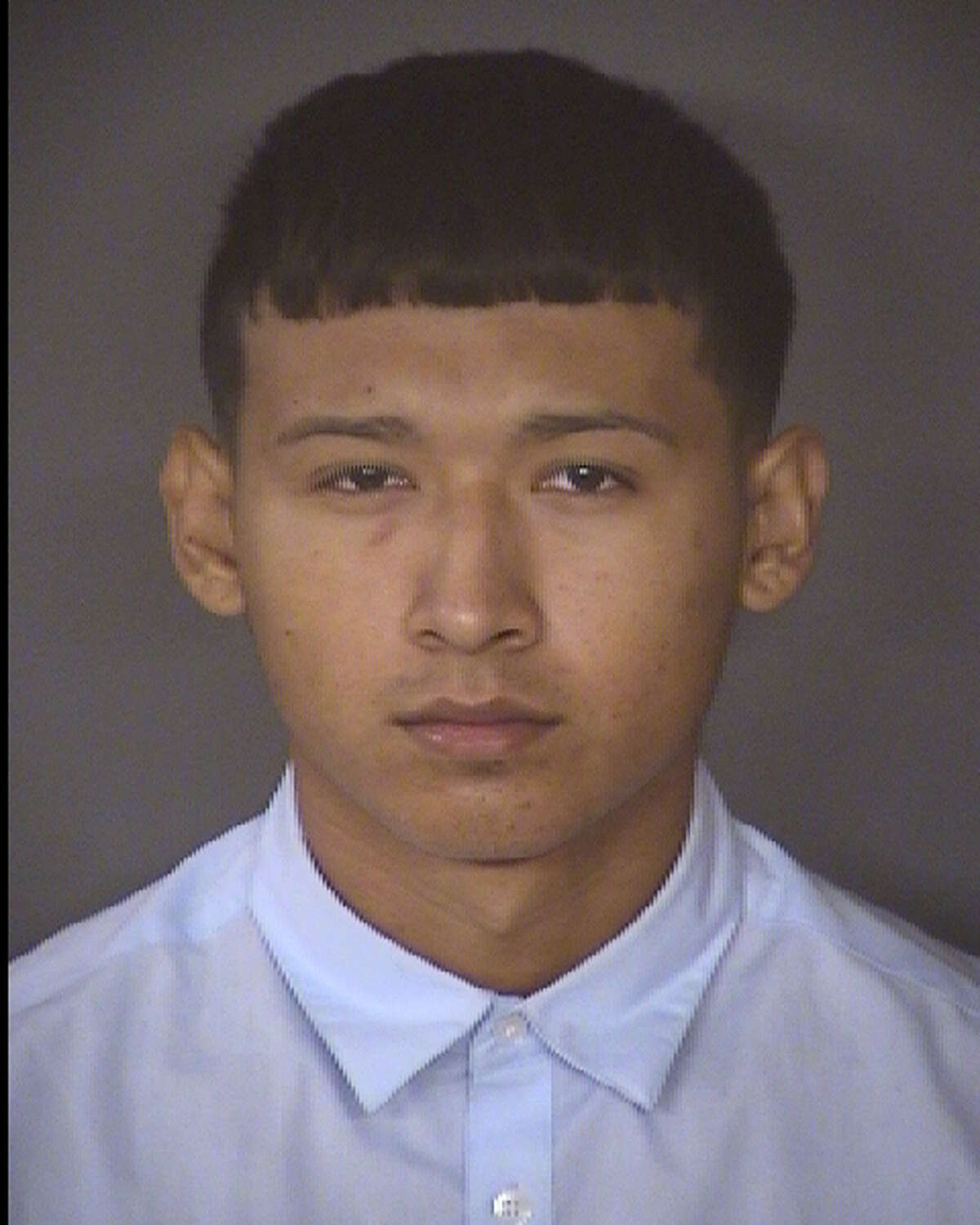 Twenty-year-old Joshua Garcia, pictured in this 2017 booking photo, faces a murder charge in the death of Erin Castro, 19.