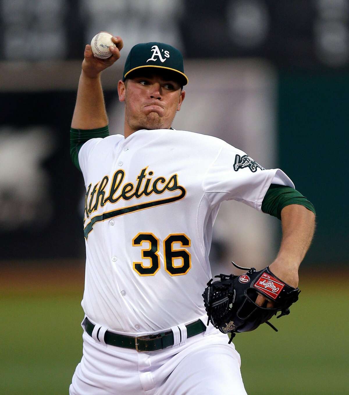 Oakland Athletics pitcher Aaron Brooks works against the Seattle Mariners during the first inning of a baseball game Friday, Sept. 4, 2015, in Oakland, Calif. (AP Photo/Ben Margot)