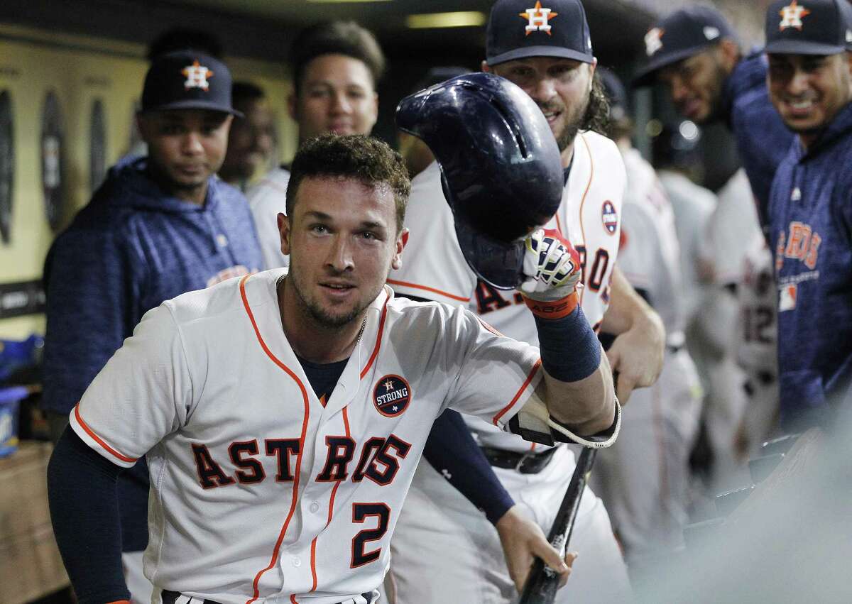 Houston Astros third baseman Alex Bregman (2) makes eye contact with the cameras in the dugout after hitting a solo home run in the first inning against the Minnesota Twins at Minute Maid Park on Monday, Sept. 3, 2018 in Houston.