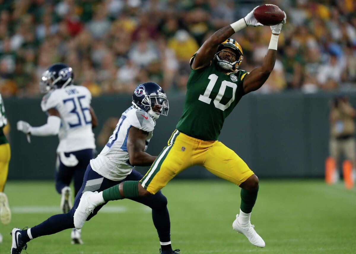 Green Bay Packers' DeAngelo Yancey catches a pass during the first half of a preseason NFL football game against the Tennessee Titans Thursday, Aug. 9, 2018, in Green Bay, Wis. (AP Photo/Matt Ludtke)