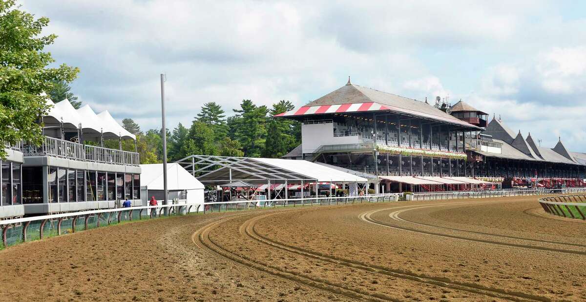NYRA plans for their new 1863 Club that would replace the luxury boxes, left, and the At the Rail Pavilion, center, were announced at Saratoga Race Course Tuesday Sept. 4, 2018 in Saratoga Springs, NY. (John Carl D'Annibale/Times Union)
