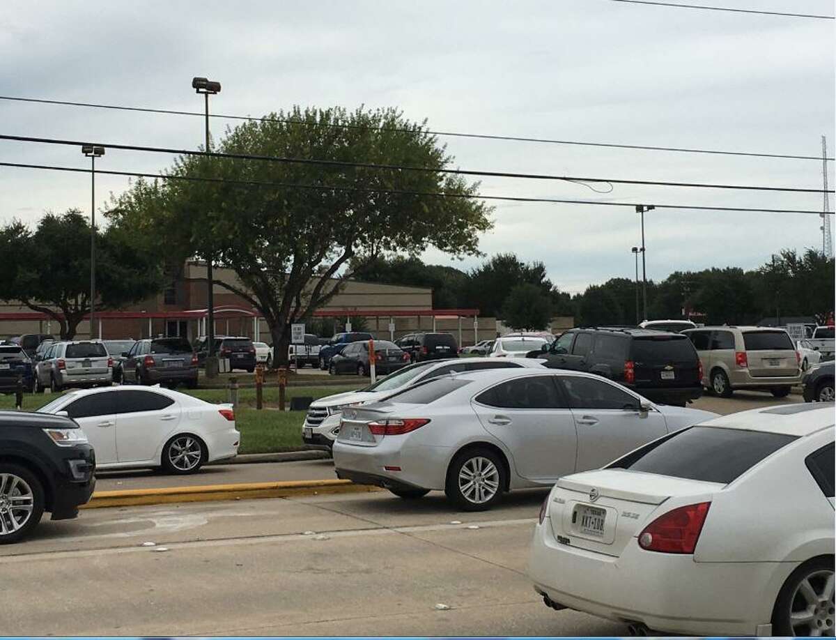 Traffic increases on Franz Road near Katy-Fort Bend Road as parents park near Katy Junior High School to pick up their children at the end of the school day.