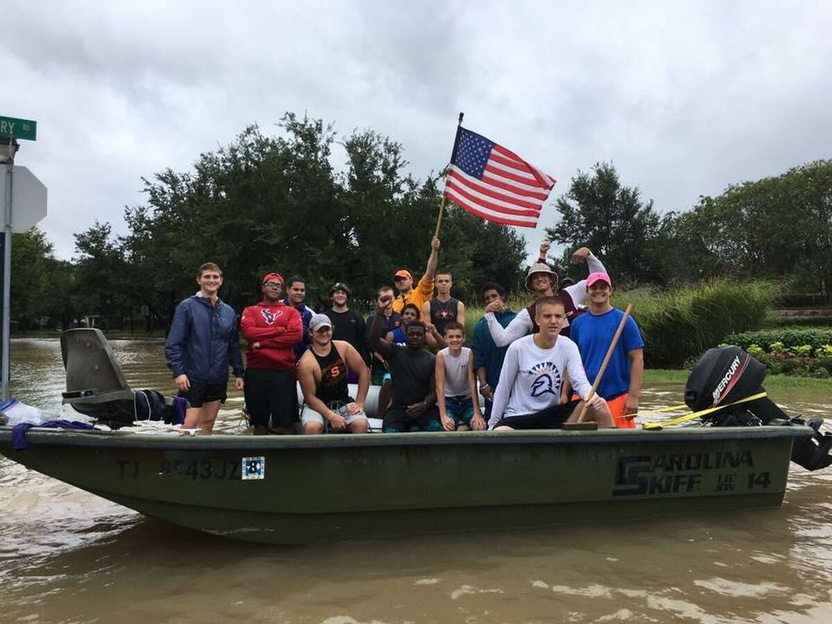 On the anniversary of Hurricane Harvey, MariAnne Vondenstein shared this photo of Seven Lakes High School football players and athletes from other sports doing home rescues for two days.