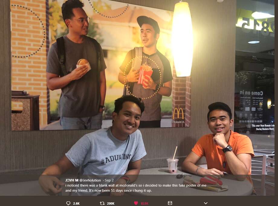 texas student secretly hangs photo of himself and friend at