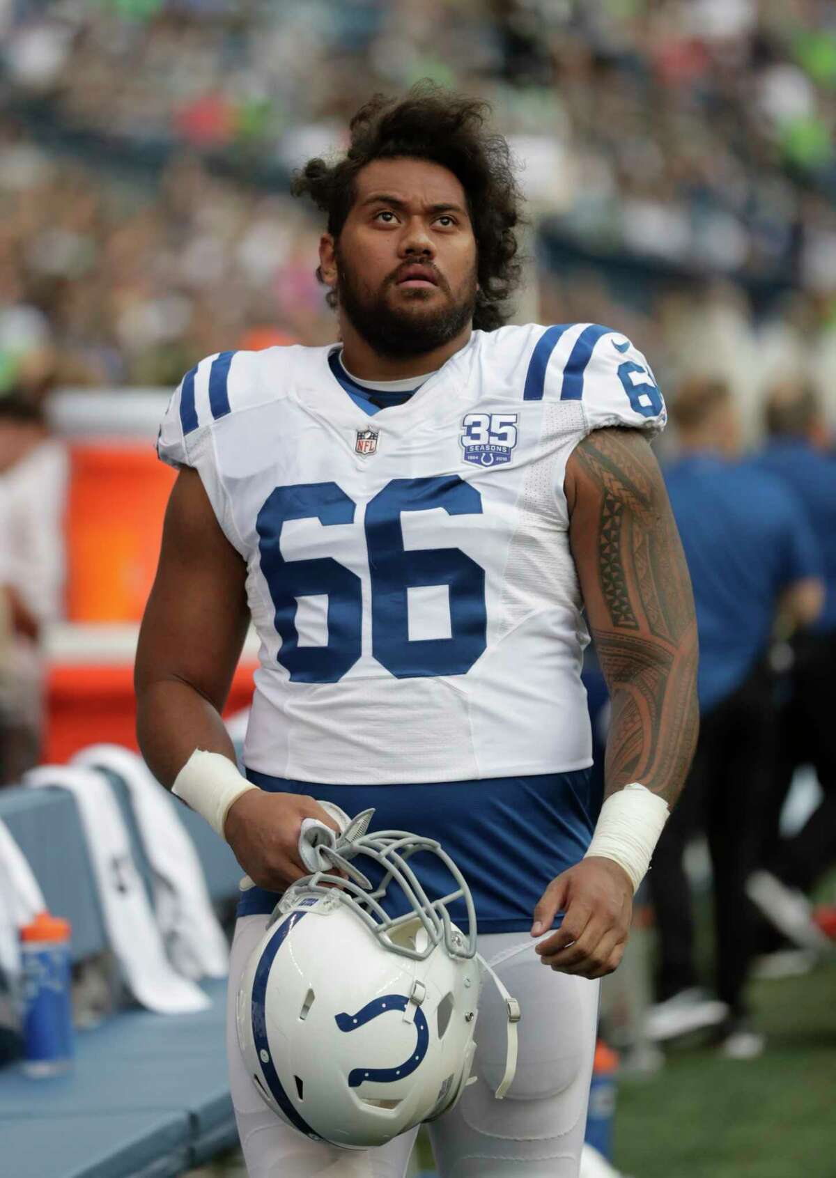 Indianapolis Colts defensive tackle Tomasi Laulile stands on the sideline before an NFL football preseason game against the Seattle Seahawks, Thursday, Aug. 9, 2018, in Seattle. (AP Photo/Stephen Brashear)
