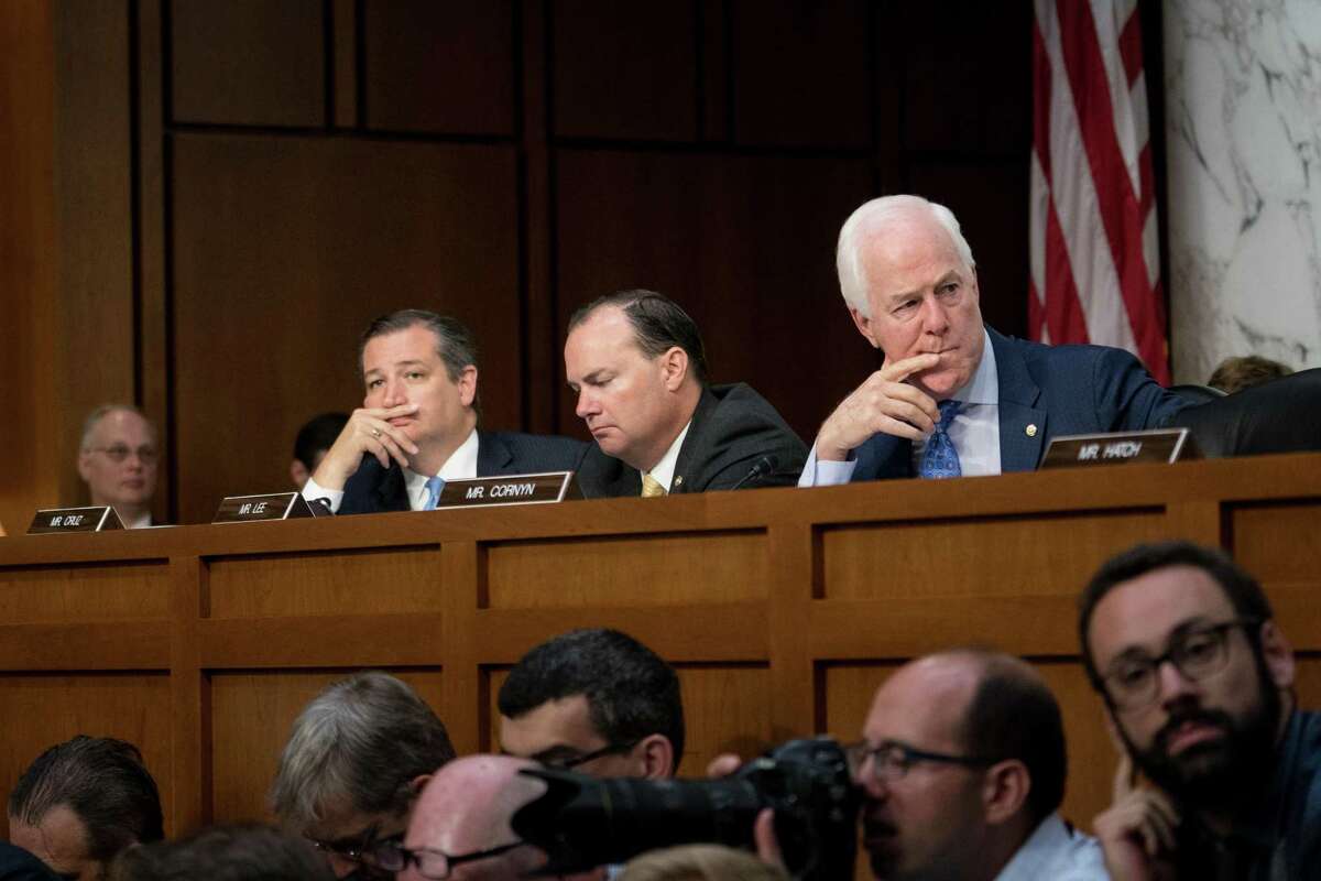 From left: Sens. Ted Cruz (R-Texas), Mike Lee (R-Utah) and John Cornyn (R-Texas) listen as the confirmation hearing for Brett Kavanaugh, President Donald Trump?’s nominee for the U.S. Supreme Court, was underway before the Senate Judiciary Committee on Capitol Hill, in Washington, Sept. 4, 2018. (Erin Schaff/The New York Times)