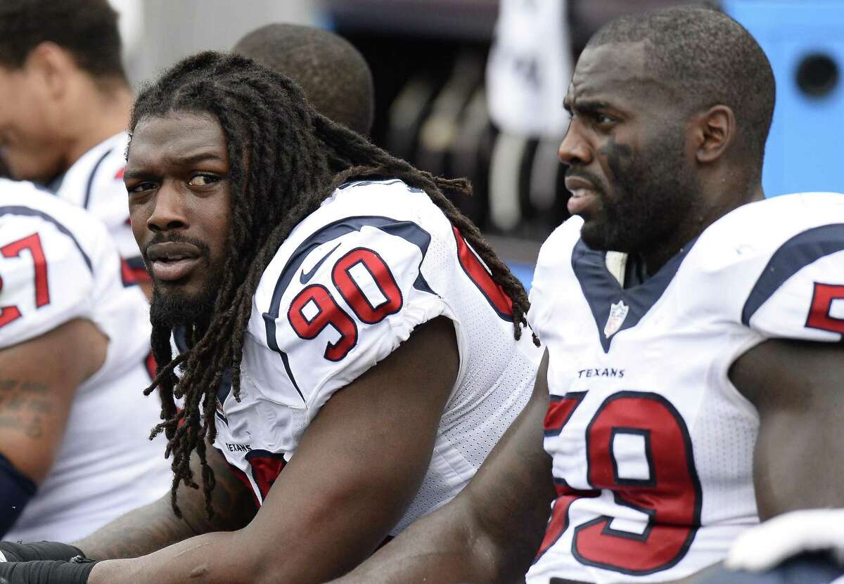 Houston Texans linebackers Jadeveon Clowney, left, and Whitney