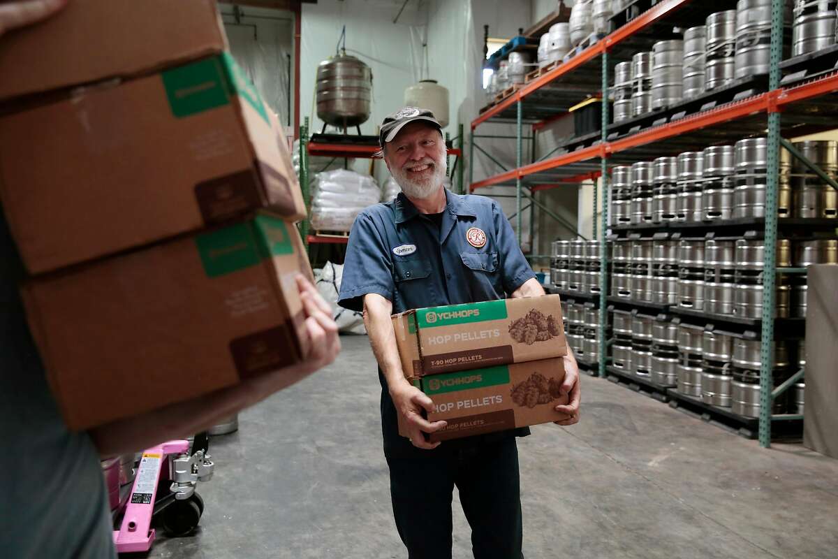 Moonlight Brewing Company founder and brewmaster helps carry boxes of hop pellets into a walk-in refrigerator in Santa Rosa, California, Friday, August 31, 2018. Moonlight opened a new taproom attached to the brewery a few months ago. Ramin Rahimian/Special to The Chronicle