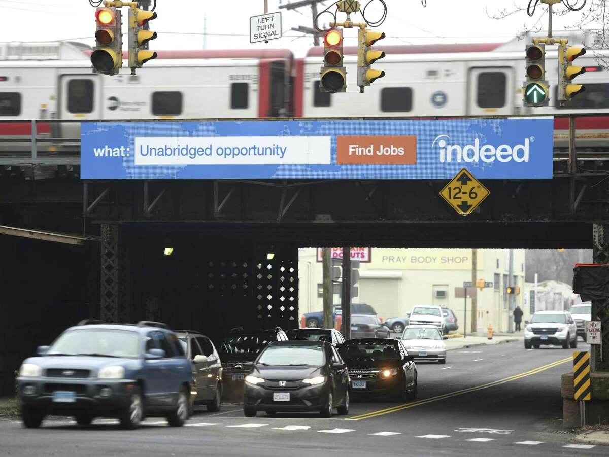 A billboard for Indeed, an online job search website, hangs on the Elm Street Metro-North overpass in Stamford.