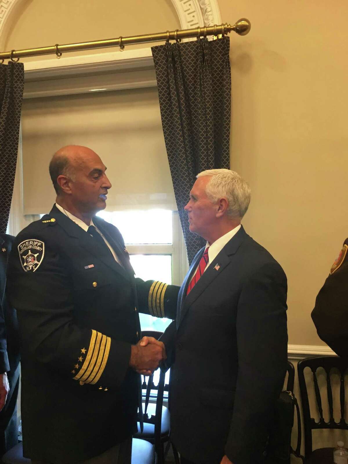 Rensselaer County Sheriff Patrick Russo shakes hands with Vice President Mike Pence at the White House, Washington D.C. Wednesday Sept. 5, 2018.