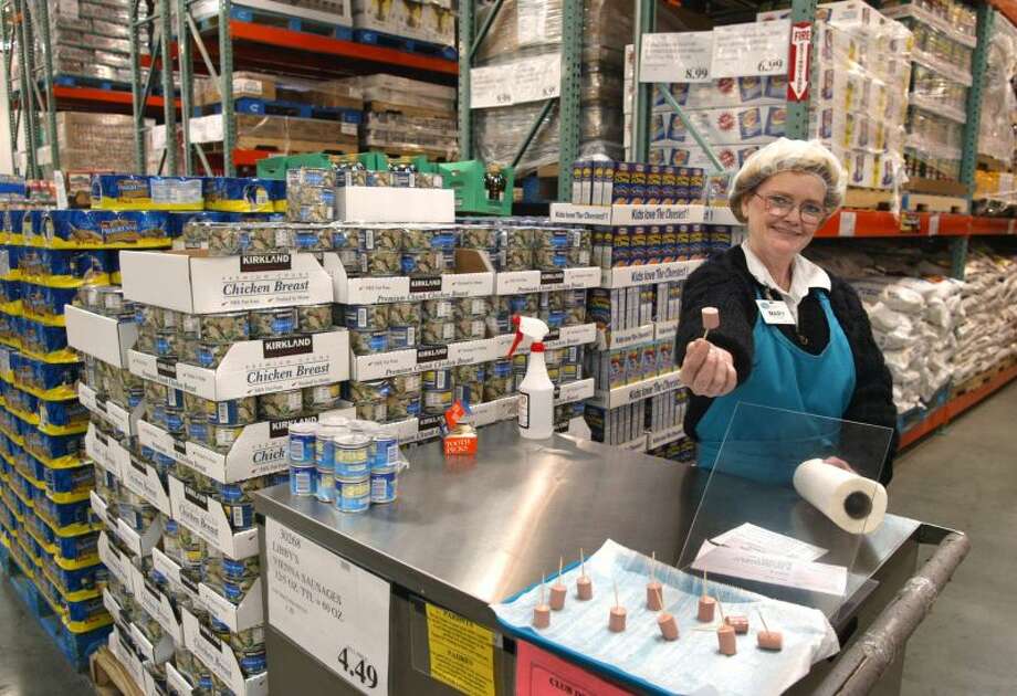 Costco is bringing back its free-sample service, but the company has been mum about how it will work. The finger foods will almost certainly not be distributed from counters like this. Photo: Tim Boyle | Getty Images