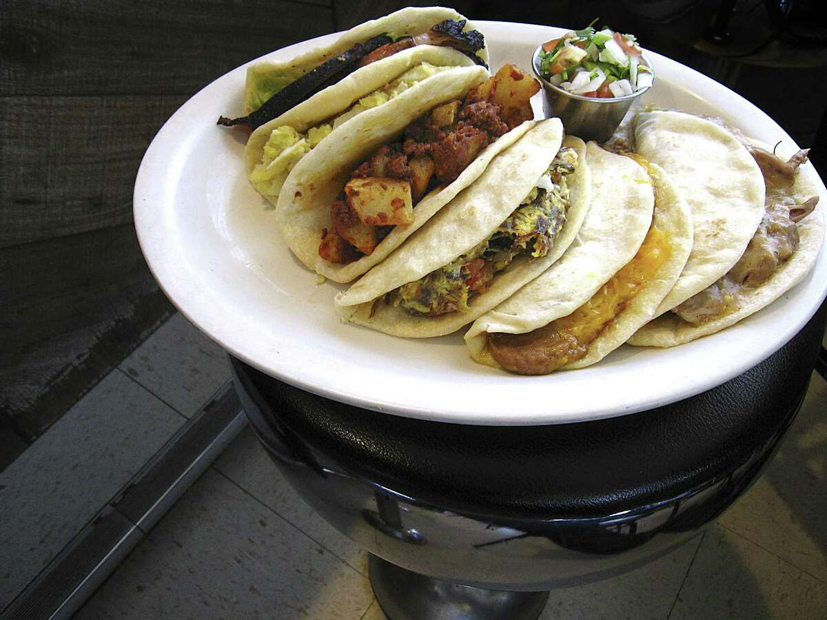 From left: smoked pork loin, potato and egg, chorizo and potato, machacado a la mexicana, bean and cheese and puerco con chile verde