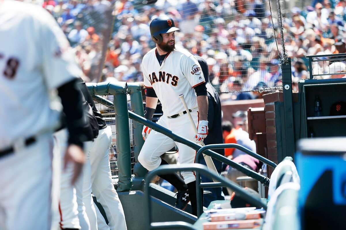 San Francisco Giants first baseman Brandon Belt walks on deck on July 11, 2018, in San Francisco.