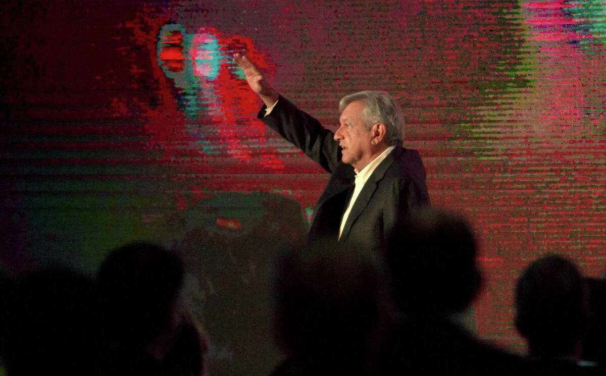 Mexico's President-elect Andres Manuel Lopez Obrador waves during a meeting with businessmen of the state of Nuevo Leon, in Monterrey, on September 4, 2018.